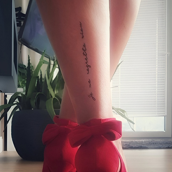 Scripted Quote Along the Side of the Leg