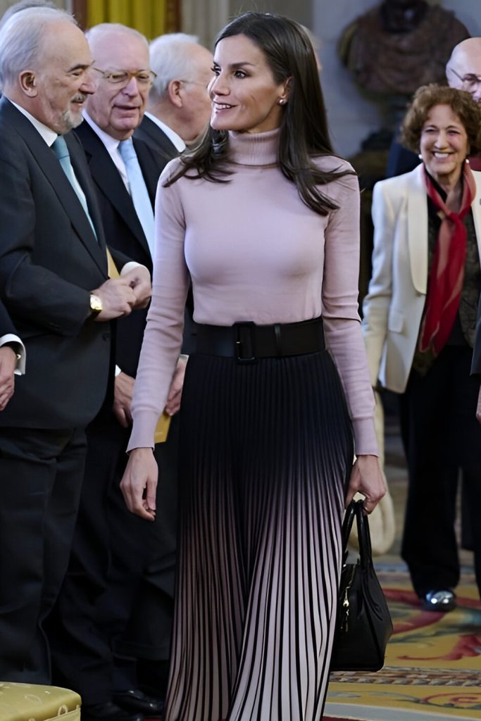 Turtleneck Sweater and Pleated Midi Skirt