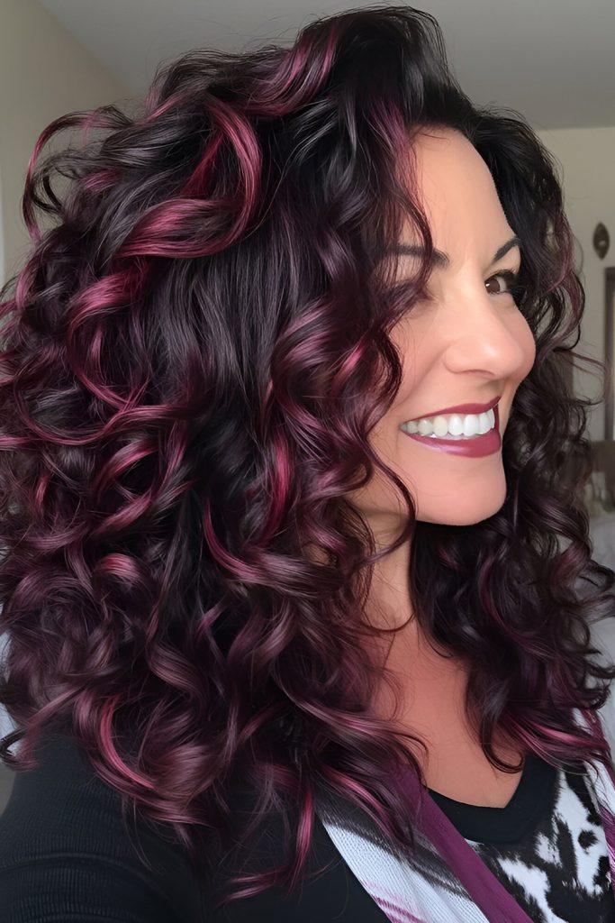 Burgundy Curls with Subtle Highlights