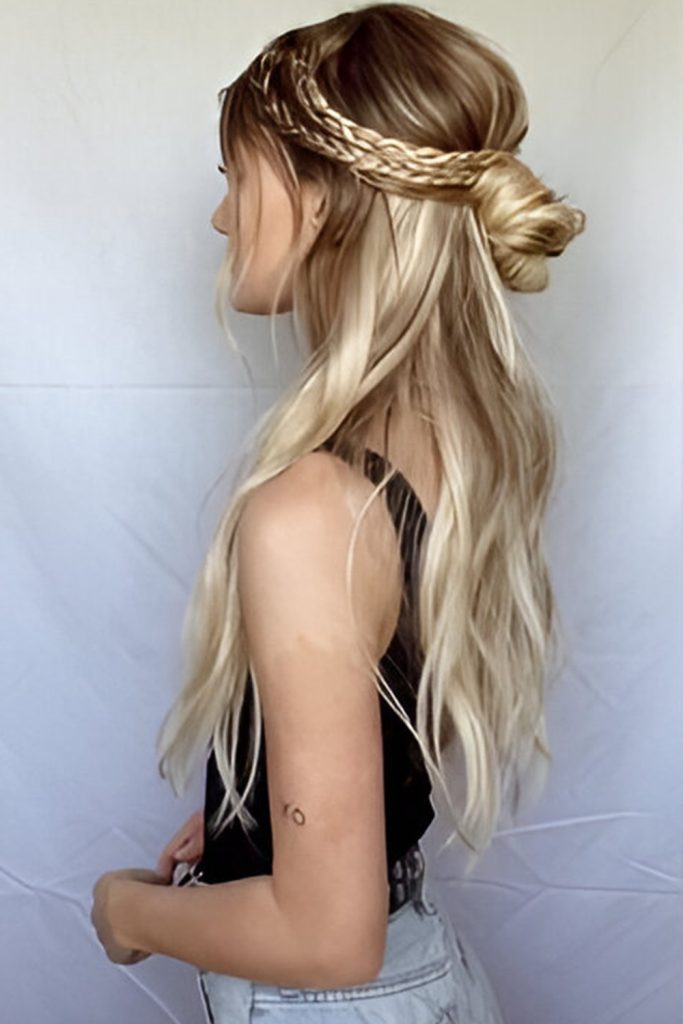 Unkempt Low Bun with Face Framing Strands