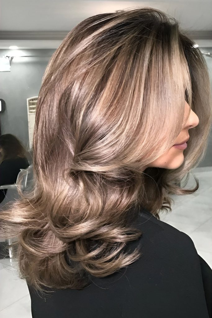 Blow Dry with a Round Brush Achieve Volume and Movement