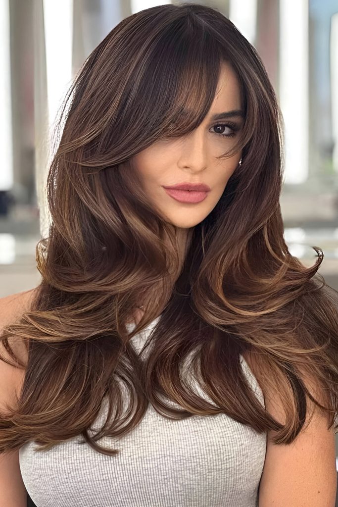 Long Layers with Curtain Bangs and a Deep Side Part