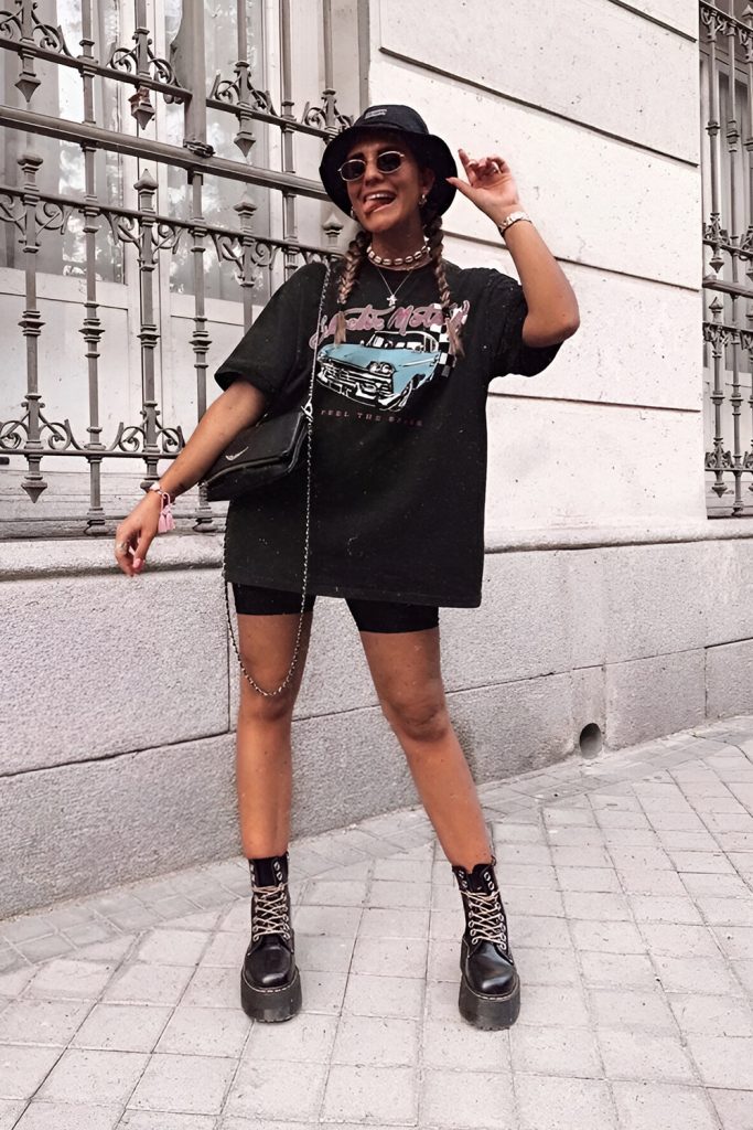 Oversized Flannel Shirt Paired with Bike Shorts and Chunky Boots