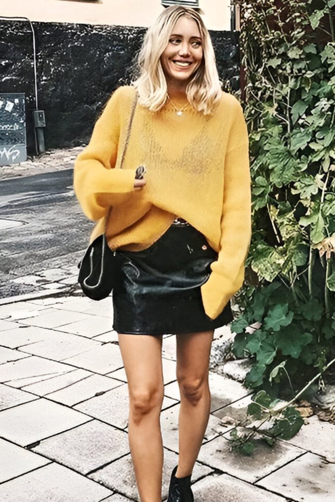 Sleek Sleeveless Knits with Edgy Leather Skirts