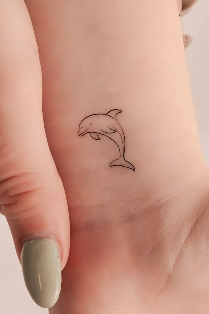 Mini Dolphin Tattoos for a Splash of Ocean Joy