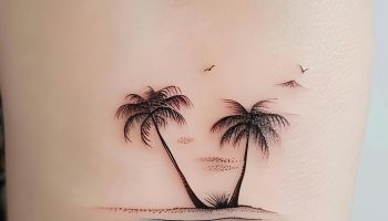 Small Beach Scene Tattoos Entire World in One Design