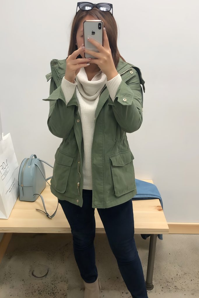 Blurred Olive Jacket Layered Over Cream Outfits