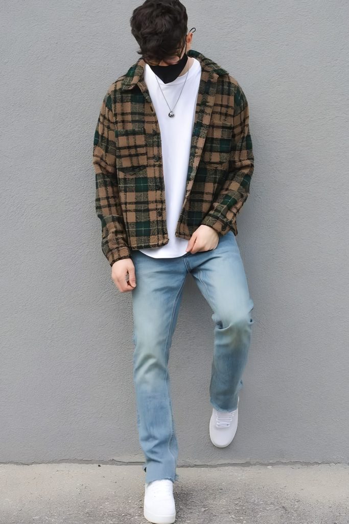 Layer Flannel Shirts Over Distressed Denim