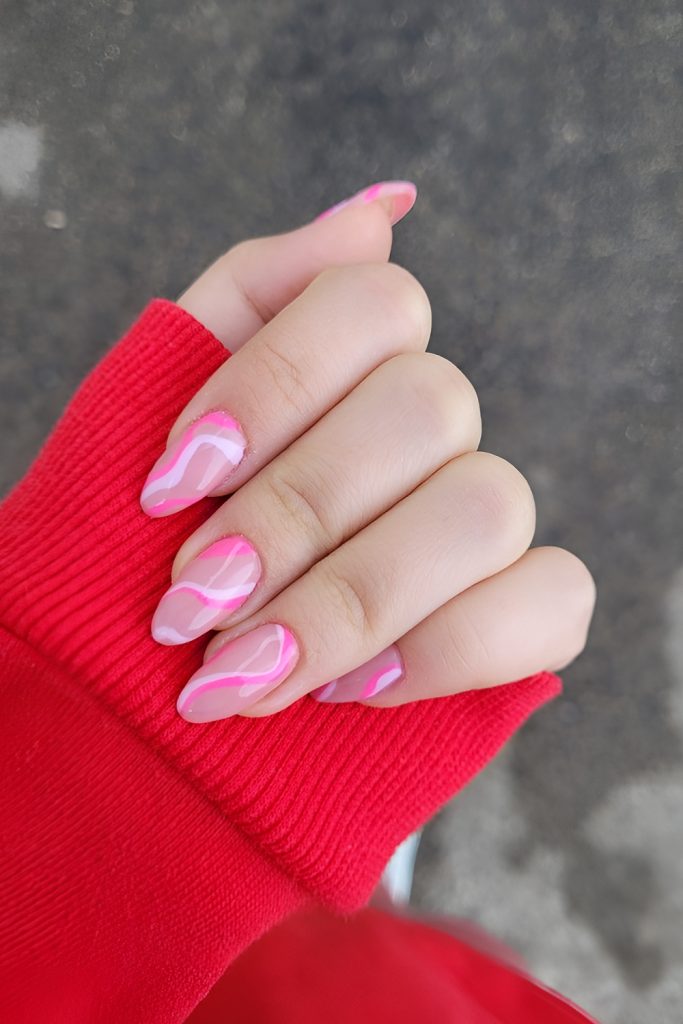 Pale Pink Nails with Lasso Inspired Swirls