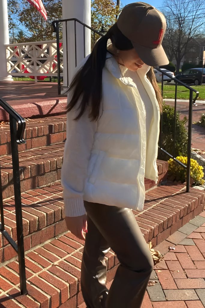 Puffer Vest over a Knit Ensemble