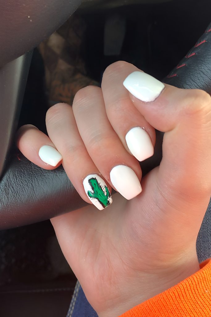 White Tips with Cactus Art on Ring Fingers