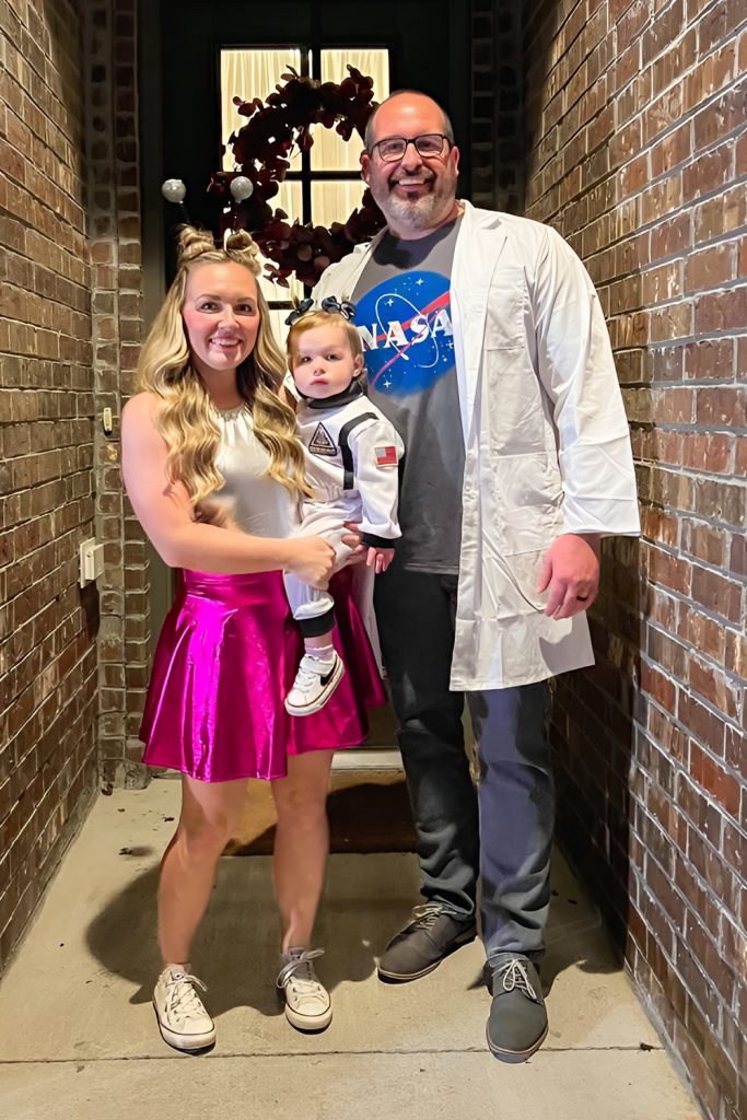 Astronaut Family Returning Home With Their Alien Friend