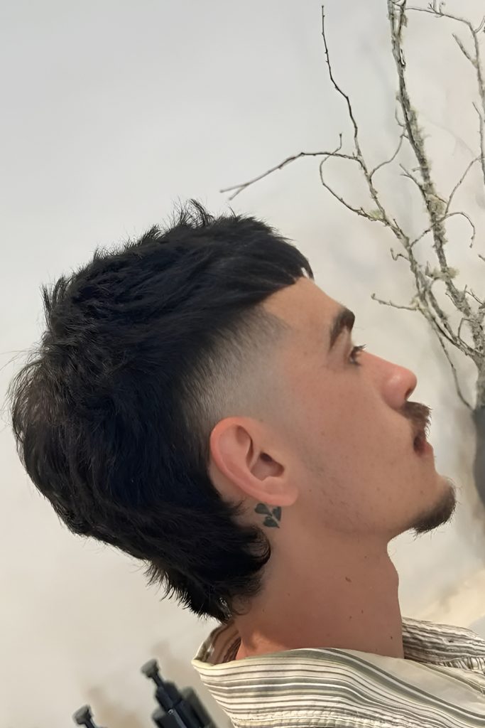 Combining a Fade with a Mullet for a Hip Retro Look