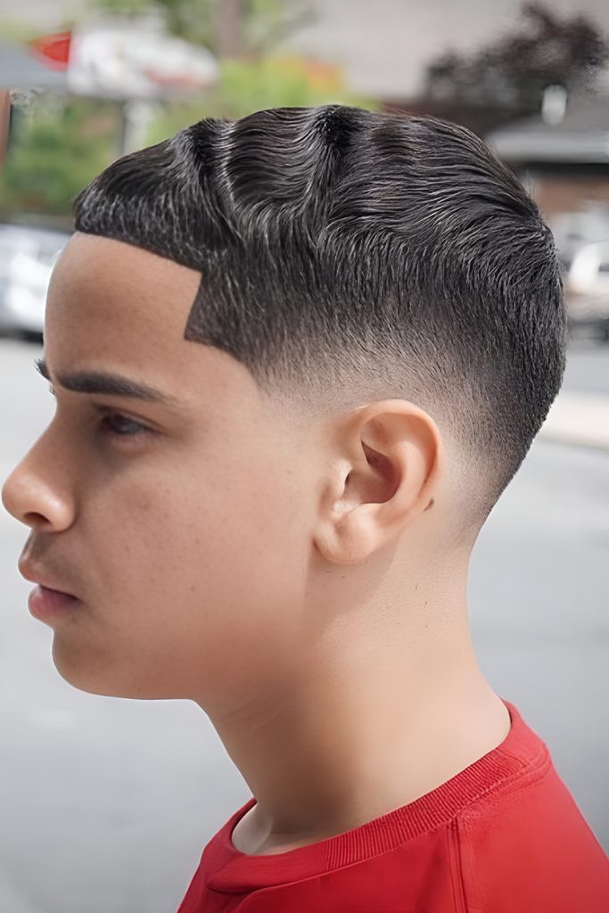 Combining a Low Fade with Waves for a Sleek Finish