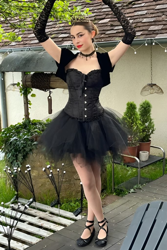 Dance Between Light and Dark as a Black Swan Ballerina