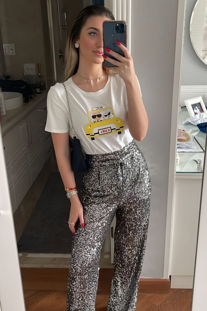 Disco Queen Authenticity with Flared Pants and Glitter