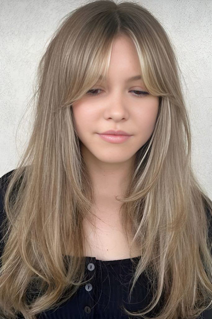 Face Framing Blonde Strands for a Bright Lift