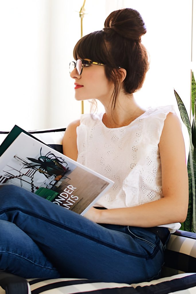 High Bun with Bangs for a Chic Contrast