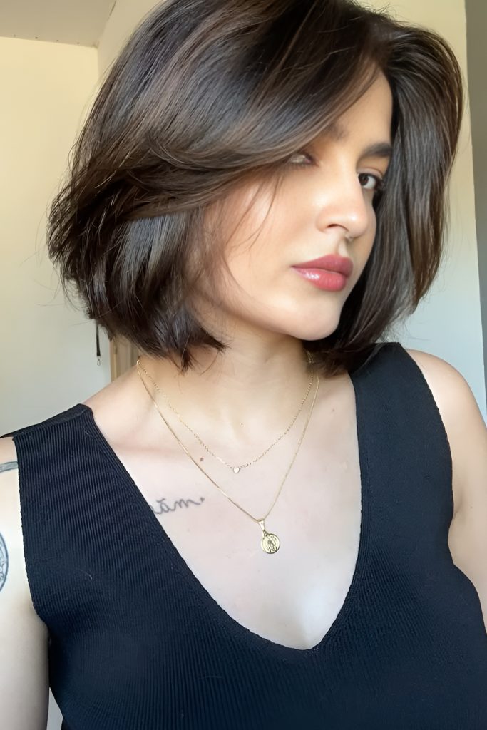 Low Key Drama in a Blunt Bob with Face Framing Highlights