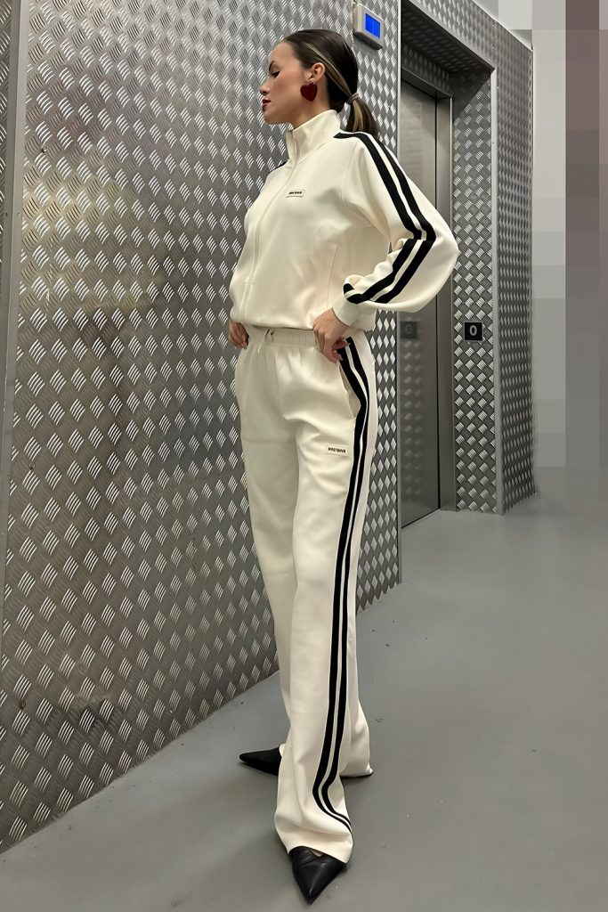 Sporty Tracksuits Elevated by High Shelf Accessories
