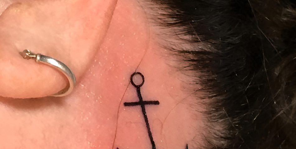 Stacked Stud Trios with a Fine Line Anchor Tattoo
