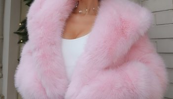 Baby Pink Faux Fur Coat over a White Jumpsuit