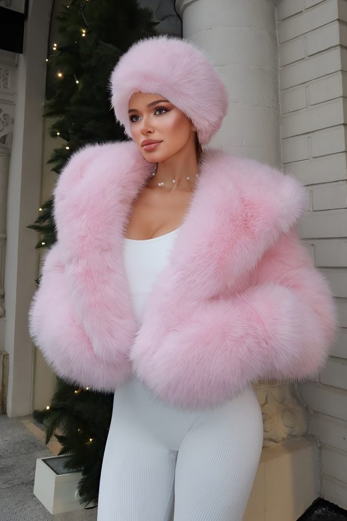 Baby Pink Faux Fur Coat over a White Jumpsuit