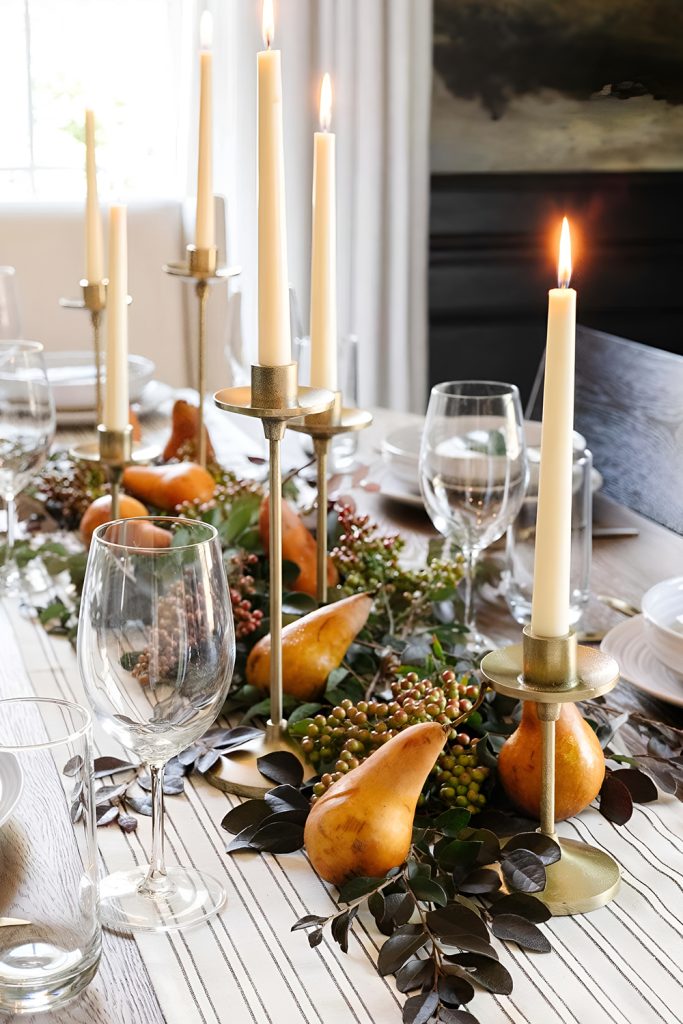 Candles and Greenery Rather Than Fancy Centerpieces