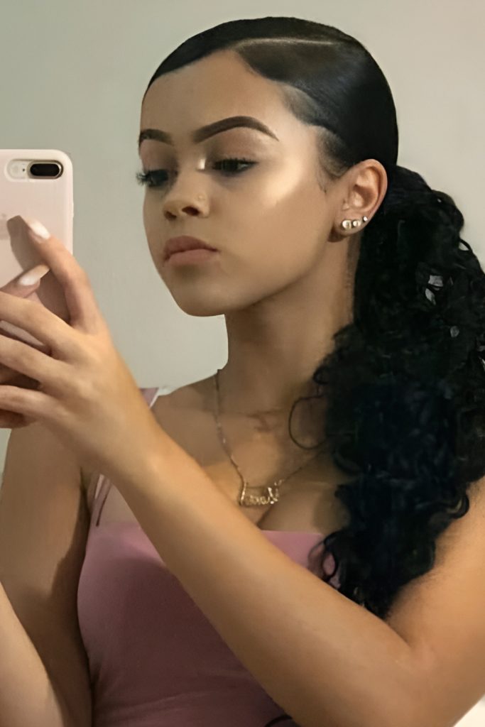 Curly Side Ponytail for Fun and Glam