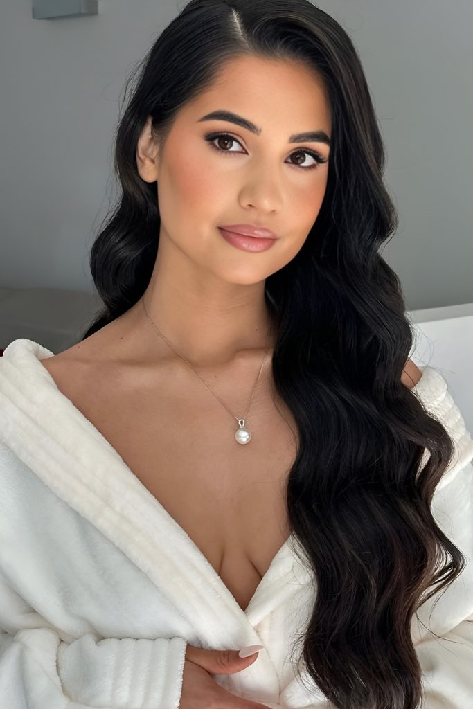 Glitzy Side Swept Curls for Special Nights