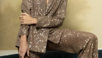 Gold Sequin Blazer over a Simple Black Outfit