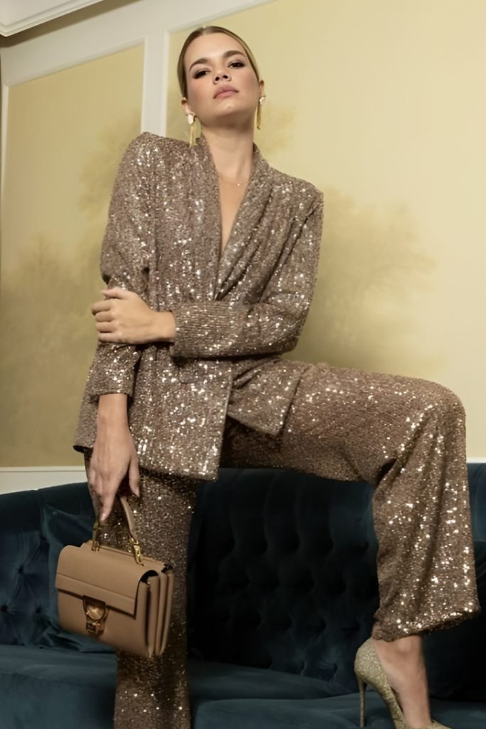 Gold Sequin Blazer over a Simple Black Outfit