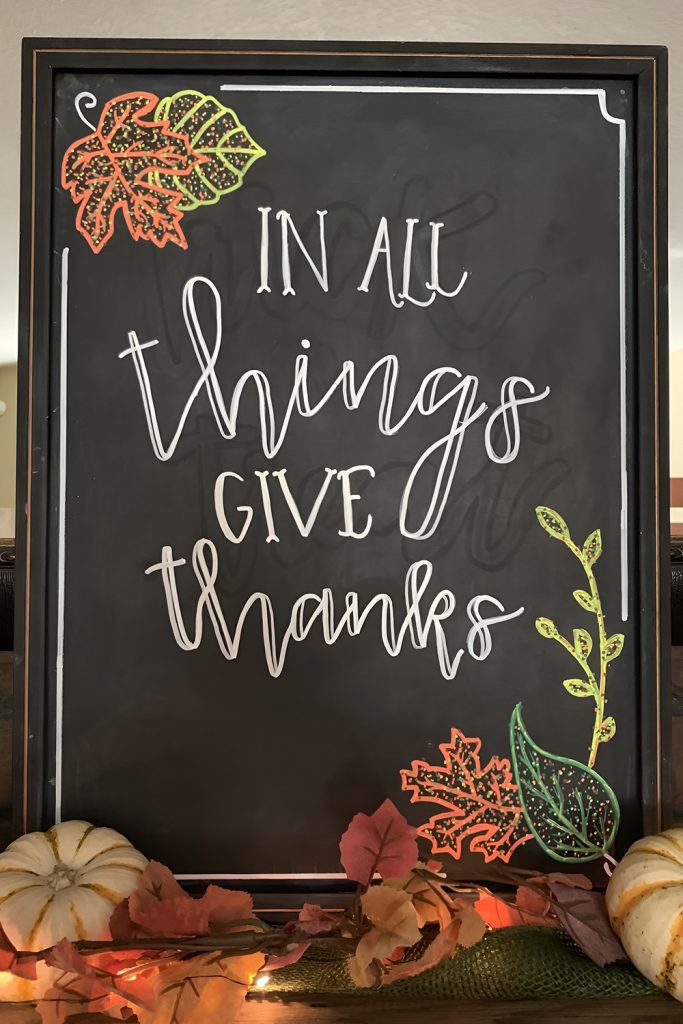 Handwritten Holiday Messages on Chalkboard Signs