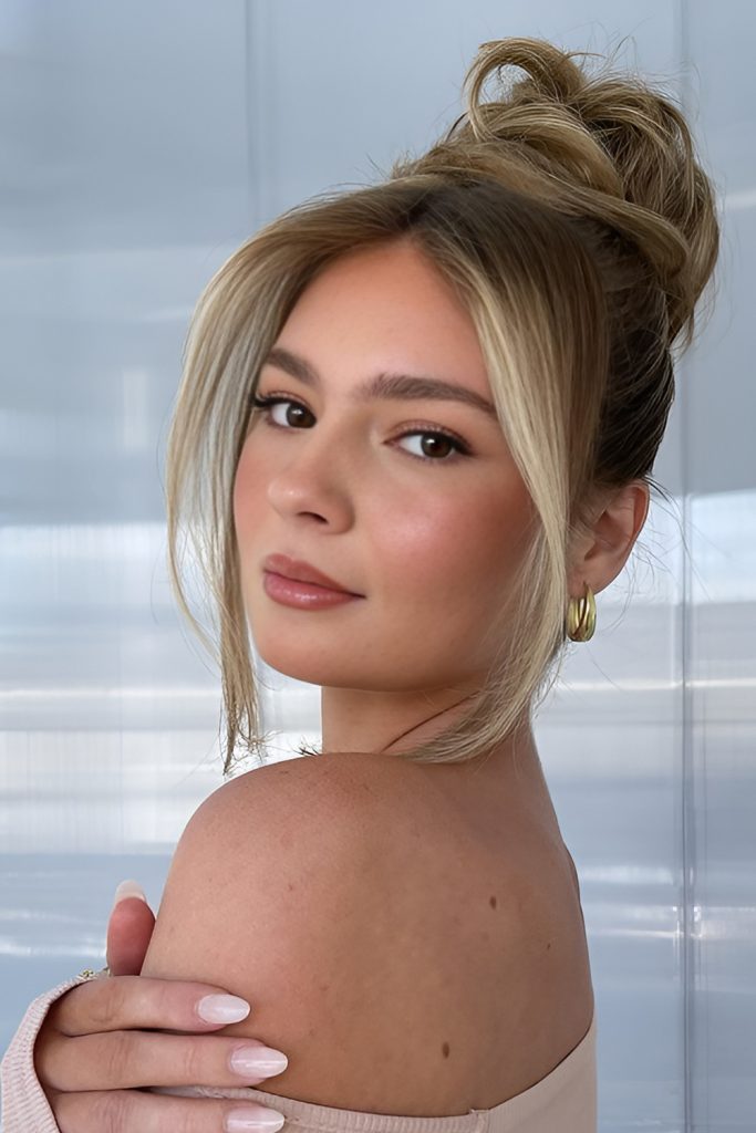 High Bun with Elegant Twist