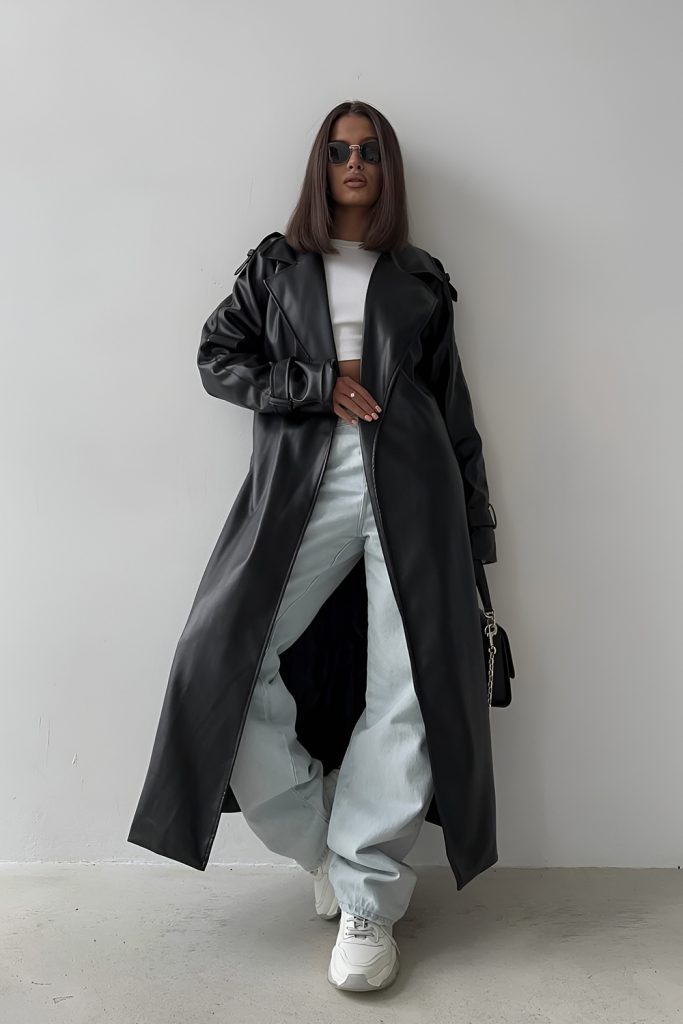 Long Coats Layered Over All Black Fits for Dramatic Impact