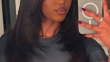 Long Silk Press with Curtain Bangs That Frame the Face