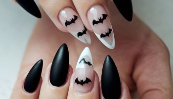 Matte Black Nails with Small Glittery Bats