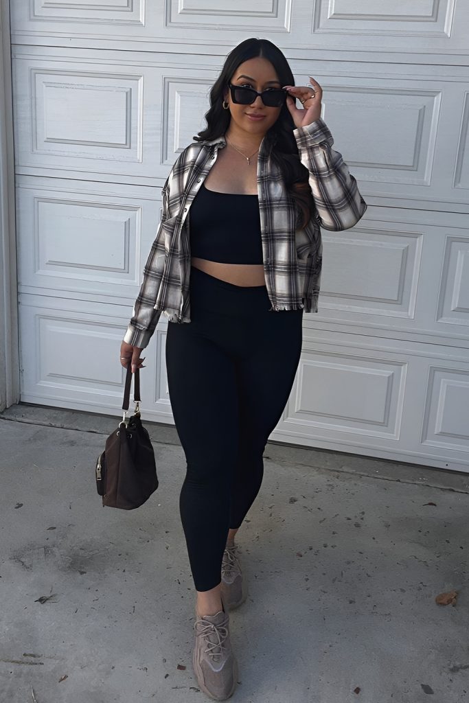 Oversized Flannel Shirt over Sports Bra and Tights