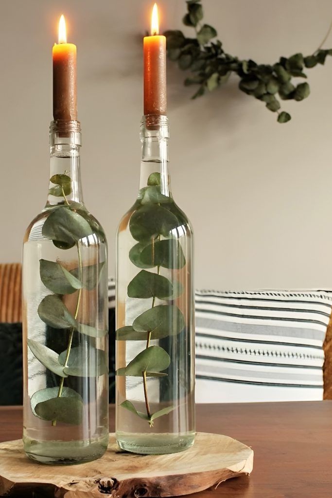 Repurposed Glass Bottles Used as Rustic Candle Holders