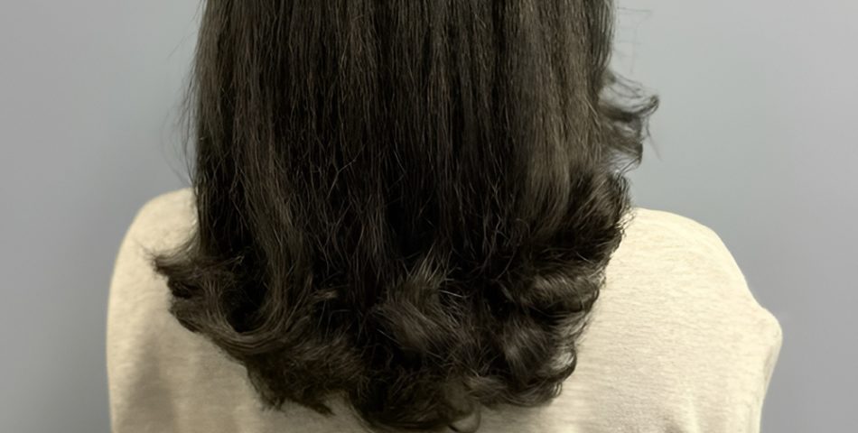 Silk Press with Soft Curls at the Ends for a Whimsical Touch