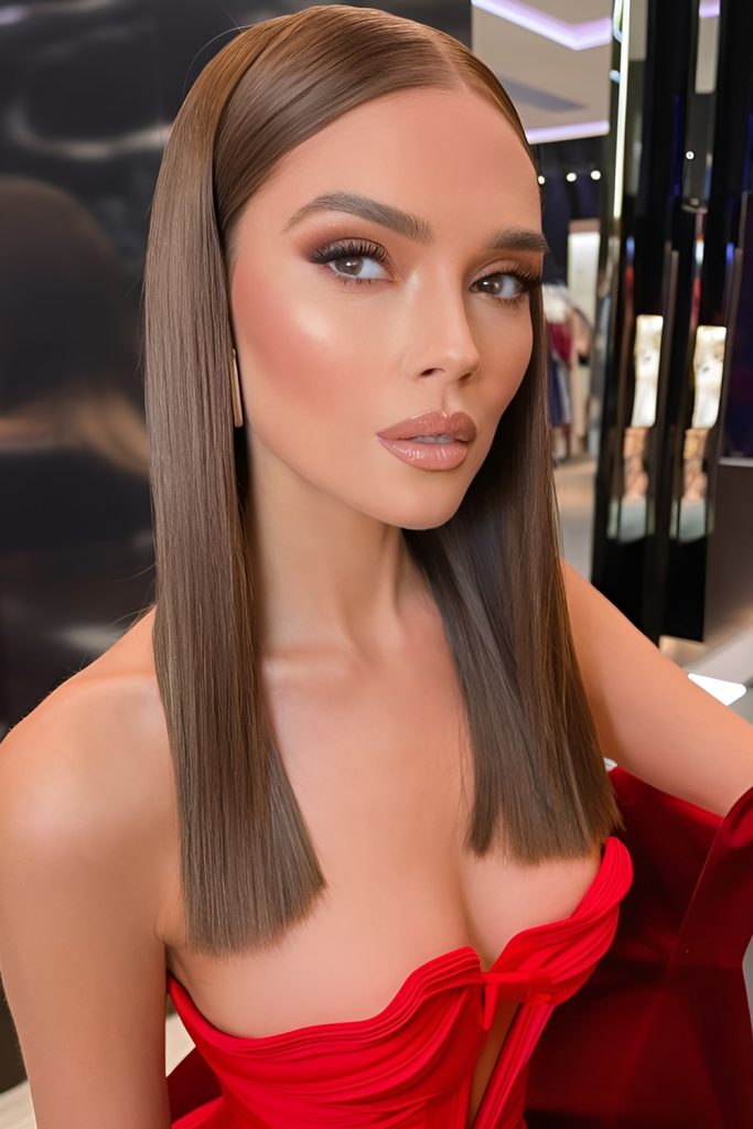 Sleek Straight Hair with a Middle Part