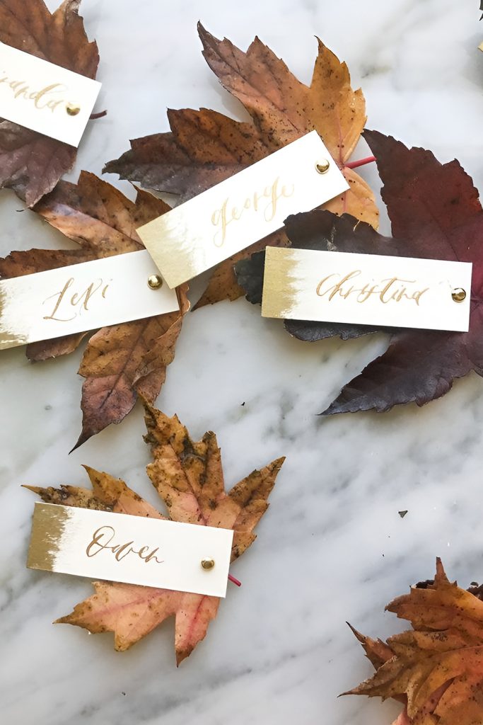 Sophisticated Place Cards Designed with Fall Leaves and Calligraphy