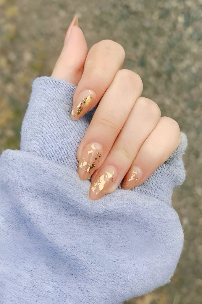 Understated Nude Nails with Small Gold Foil Accentuation