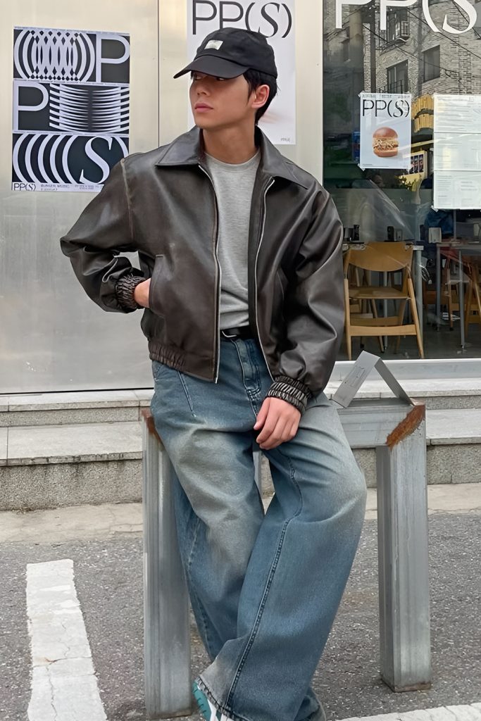 Black Leather Jacket Over Black Denim