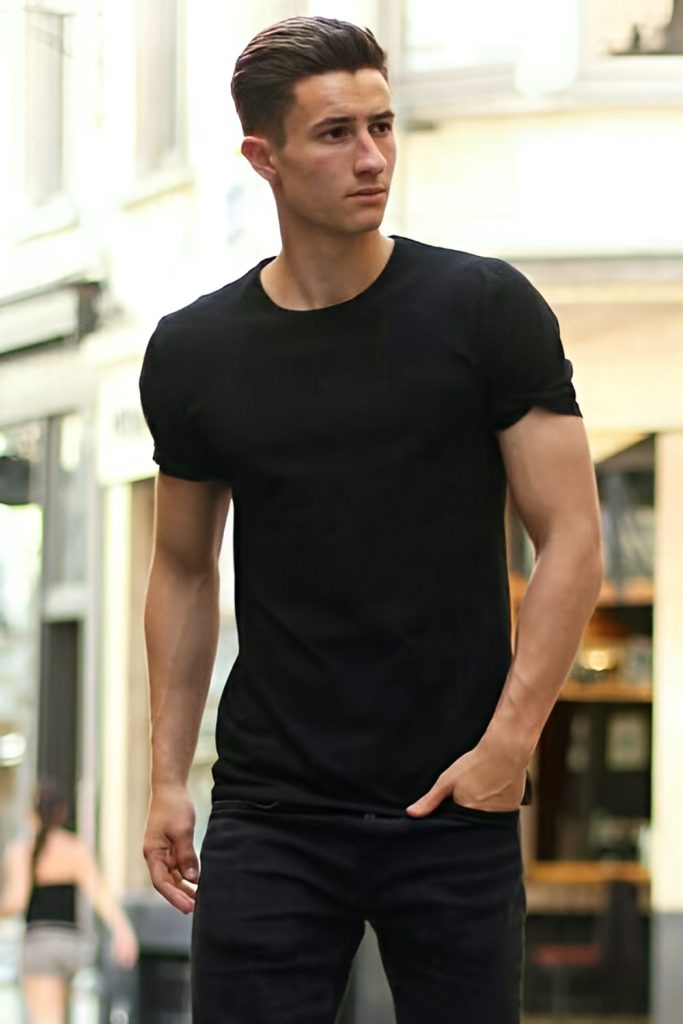 Black Shirt with Distressed Jeans for Rugged Charm