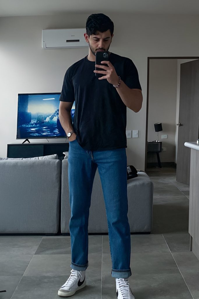 Black Top and Dark Blue Jeans for Effortless Cool