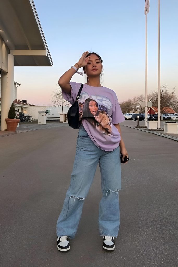 Express Personality via a Graphic Hoodie and Vintage Sneakers