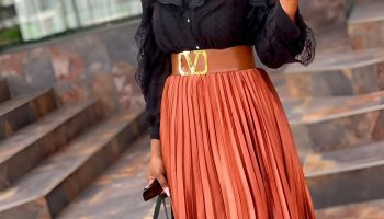 Flowing Pleated Midi Skirt with a Chic Turtleneck
