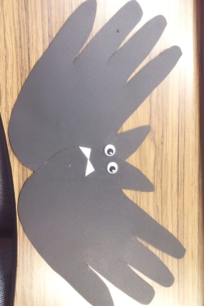 Handprint Bats Flying Across the Wall