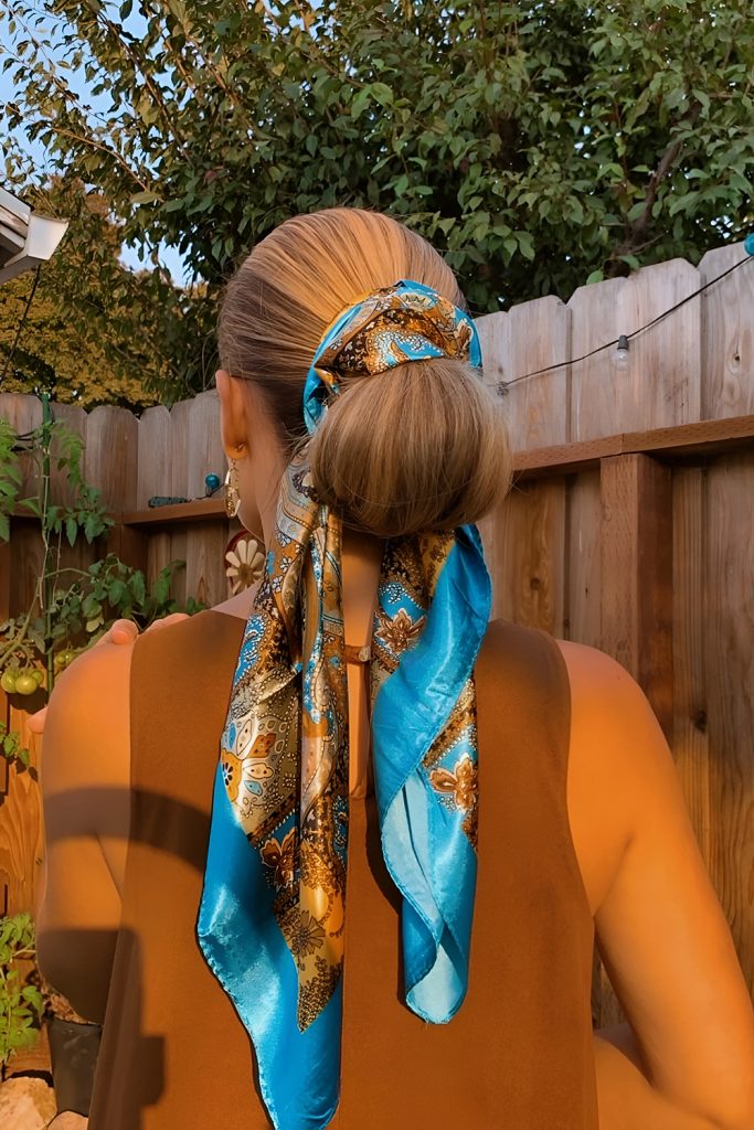 Scarf Accented Wrapped Low Bun